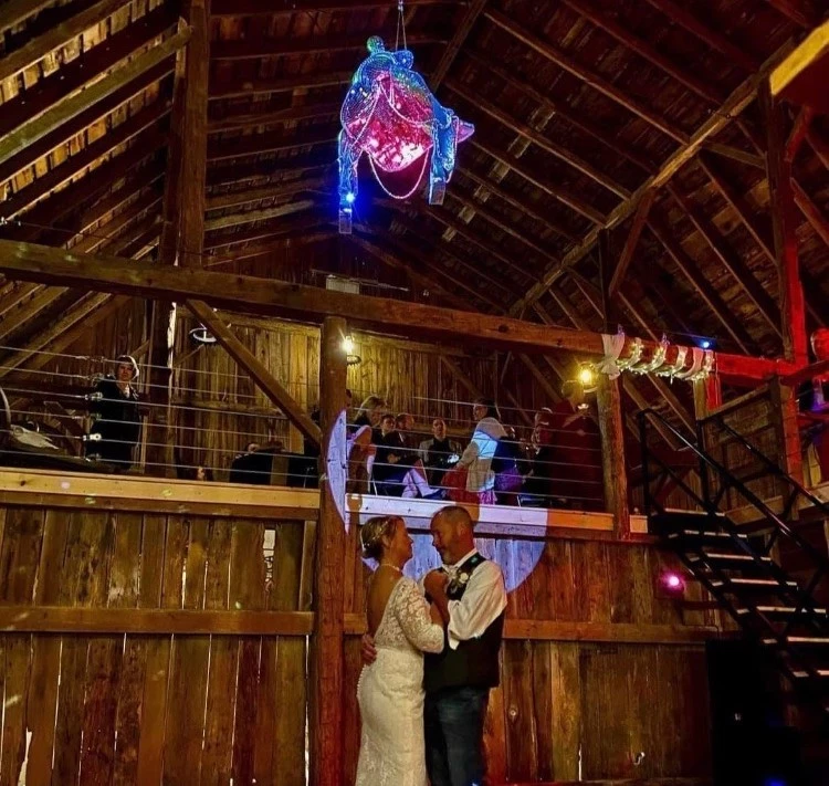 couple dancing beneath the saddle