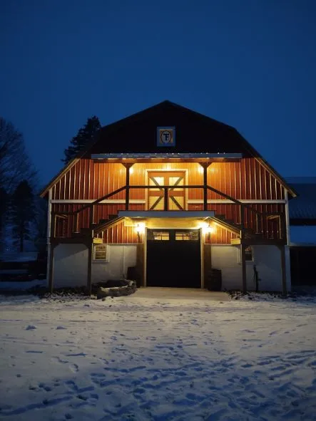 Exterior of Thornhill Farms Hitching Post barn at dusk