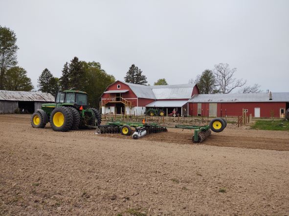 View of barn with tractor